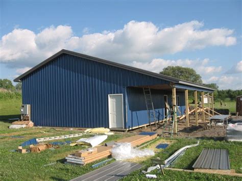 blue metal house|blue steel pole barn.